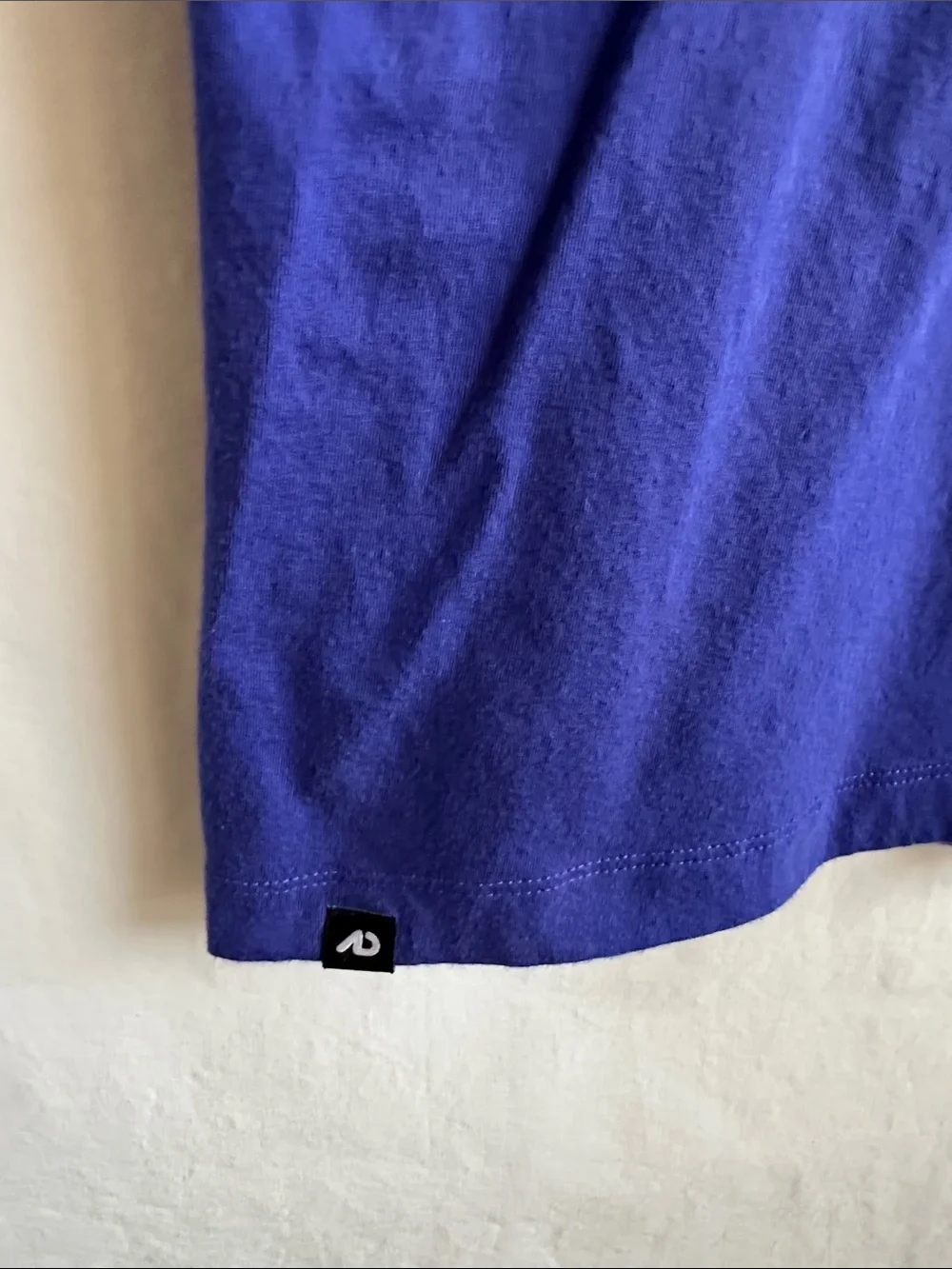 Nike blue V-neck athletic T-shirt with a white embroidered swoosh logo - Picture 4 of 7